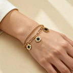 Trendy Chain Link Black Charms Bracelet in Gold Plated Stainless Steel
