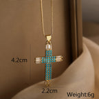 Collection of Bold Gold-Plated Cross Pendant Necklaces