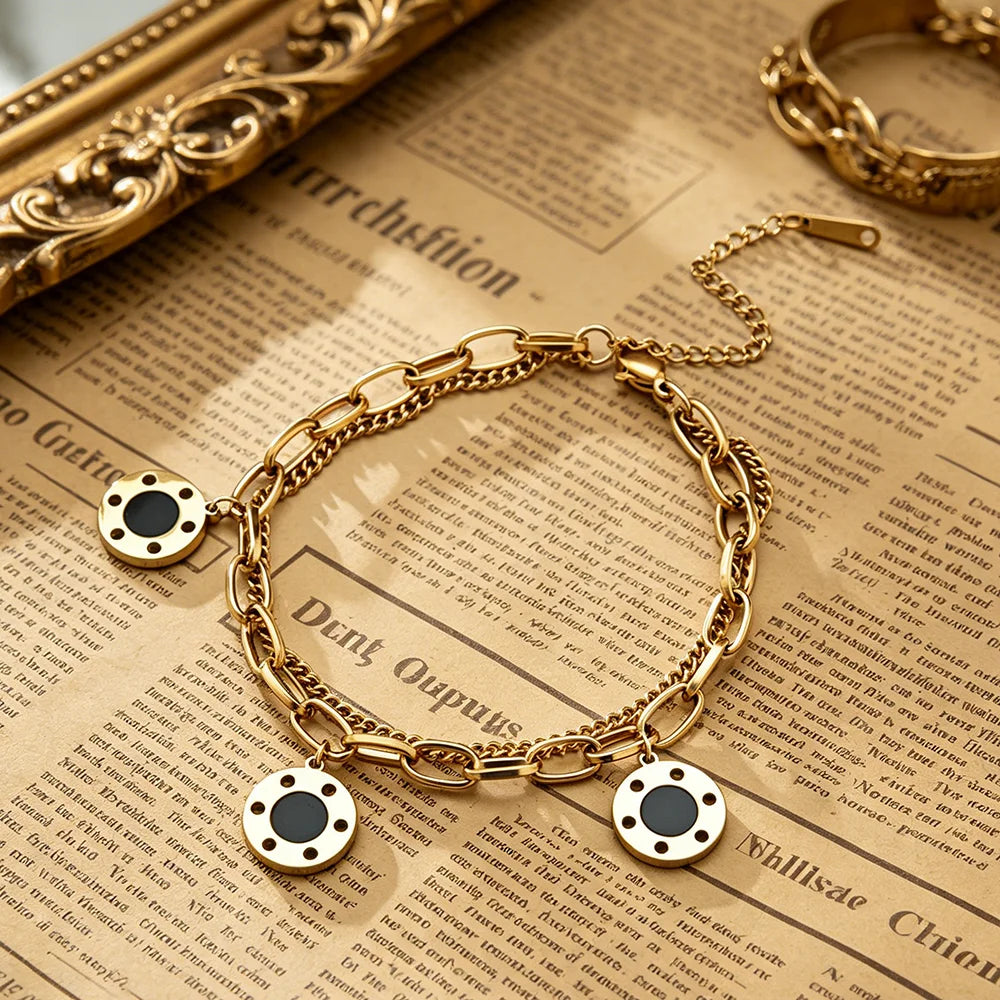 Trendy Chain Link Black Charms Bracelet in Gold Plated Stainless Steel