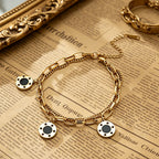 Trendy Chain Link Black Charms Bracelet in Gold Plated Stainless Steel