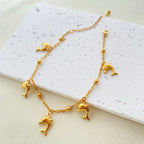 Gold Tone Stainless Steel Summer Ocean Theme Anklet - Dolphins, Starfish, Shell