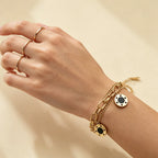 Trendy Chain Link Black Charms Bracelet in Gold Plated Stainless Steel