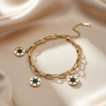 Trendy Chain Link Black Charms Bracelet in Gold Plated Stainless Steel